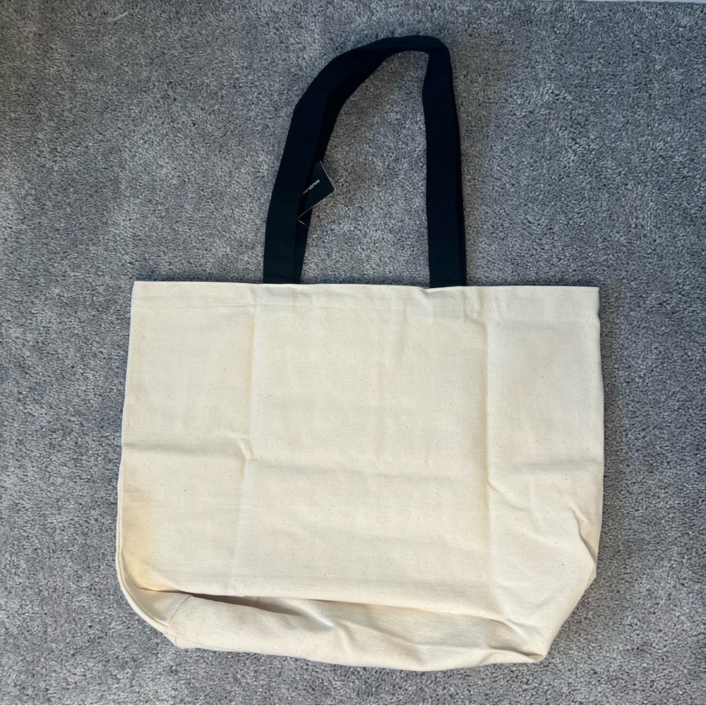 Cream Canvas Tote Bag with Black Text and Straps - Picture 3 of 3